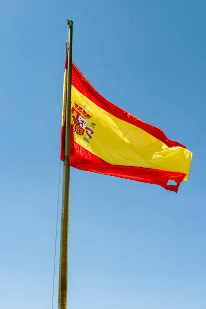 istock Spanish national flag waving majestically in the blue sky. 2185893852