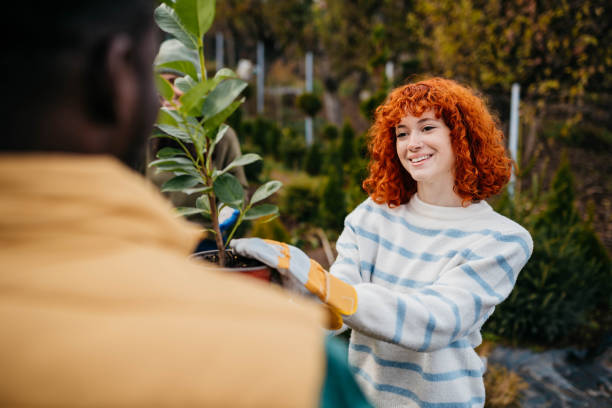 istock Volunteers in a formal garden 2185895241