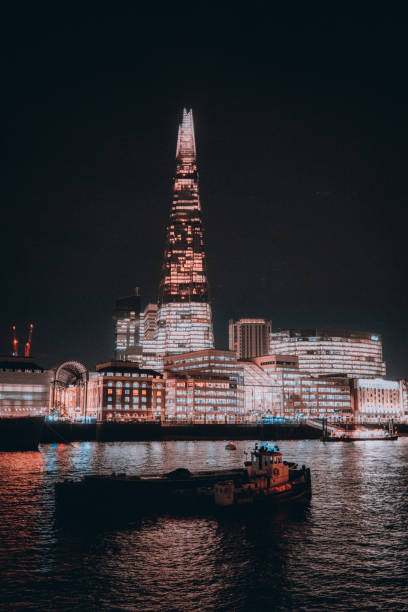 istock The Shard skyscraper illuminates the River Thames 2185897957