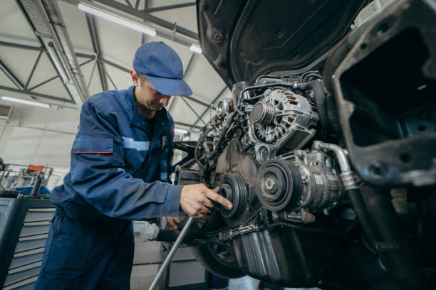 istock Auto mechanic repairs an engine. Replacing the timing chain 2185898141