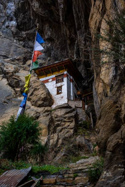 istock Tiger's Nest Monastery on a cliff with prayer flags. 2185898500