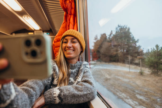 istock Woman Taking a Selfie on a Scenic Train Ride 2185898637