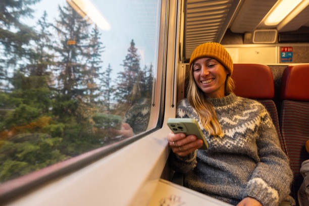 istock Happy Woman Enjoying Scenic Train Ride 2185898655
