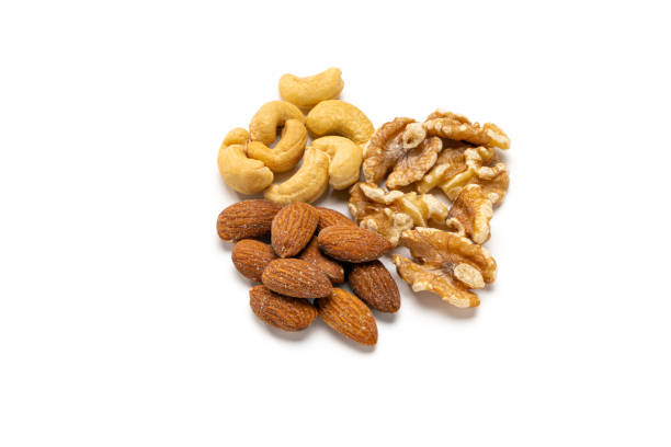 istock Assortment of nuts on white background 2185901152