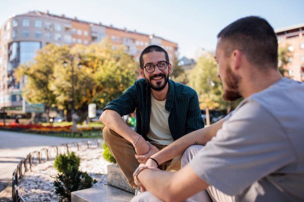 istock Male friends talking 2185901338