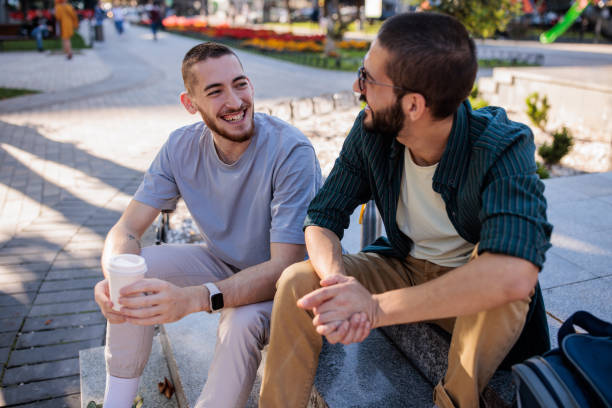 istock Male friends talking 2185901369