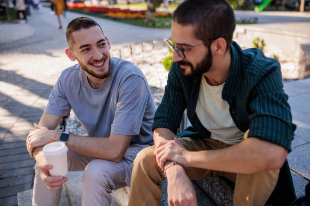 istock Male friends talking 2185901457