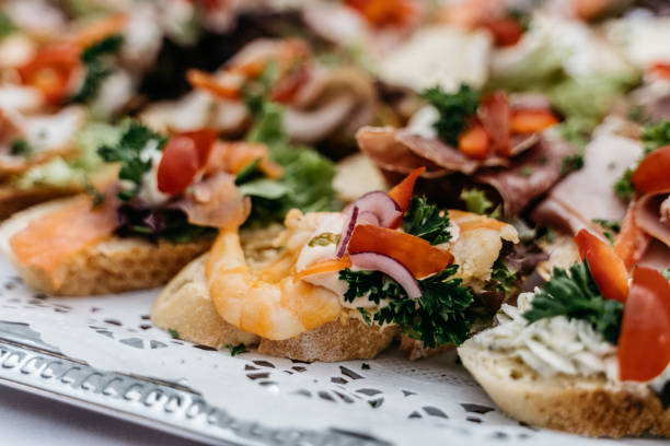 istock Gourmet Appetizers with Shrimp and Fresh Vegetables on Silver Tray 2185901821