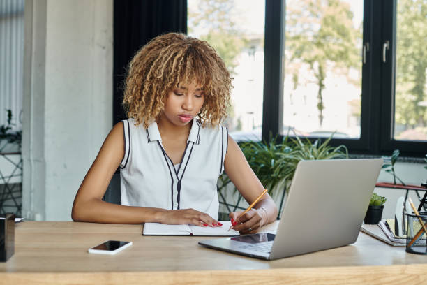istock Working diligently at a stylish office desk while planning the next business project 2185908179