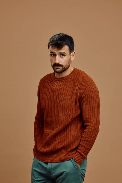 istock Studio shot of sad man looking at camera. 2185909792