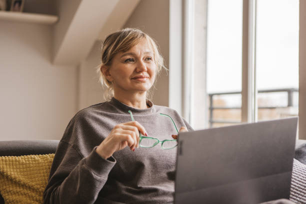 istock Contemplative mature woman 2185911473