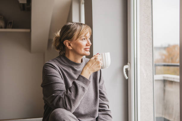 istock Contemplative mature woman 2185911506