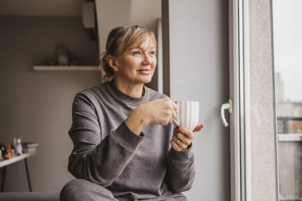 istock Contemplative mature woman 2185911507