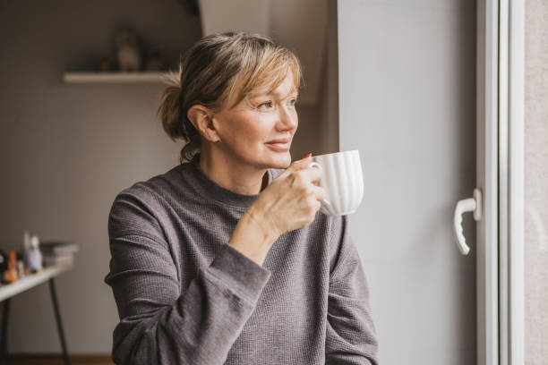 istock Contemplative mature woman 2185911509