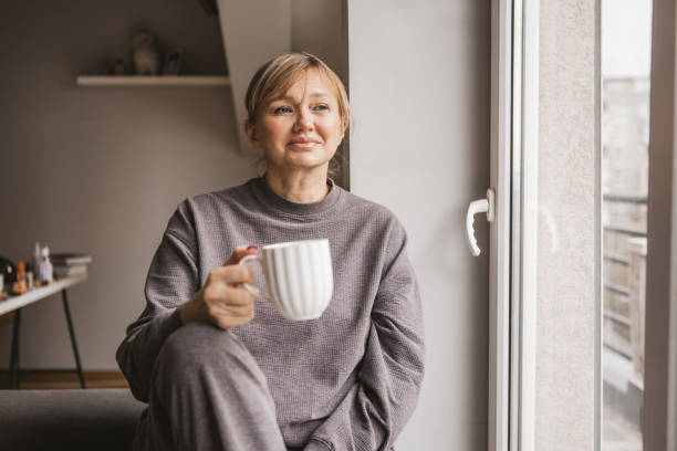 istock Contemplative mature woman 2185911552