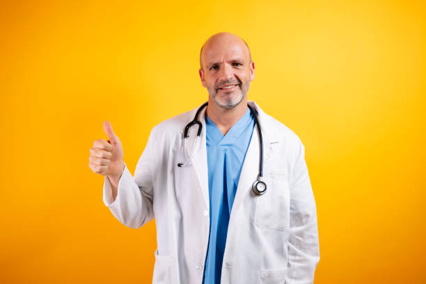 istock A doctor doing the thumbs up symbol. 2185916648