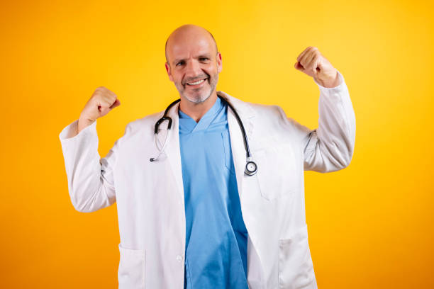 istock A doctor with his arms up. 2185916716