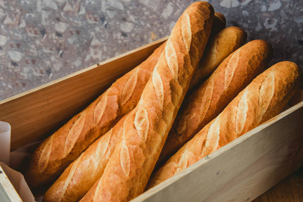 istock Rustic Display of Freshly Baked Baguettes 2185921786