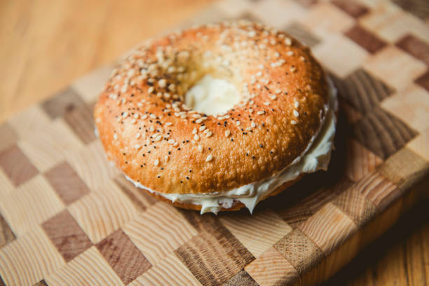 istock Sesame Bagel with Cream Cheese and Deli Meat 2185922321