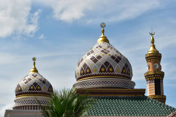 istock Beautiful mosque with the domes and one minaret 2185927849