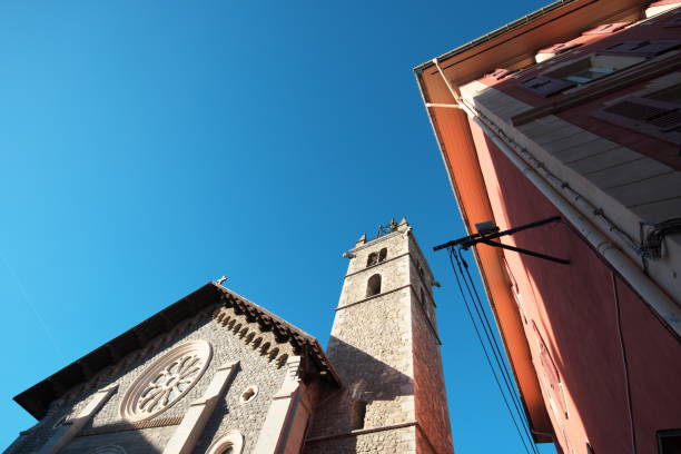 The construction of this religious building of the sub-prefecture of Alpes-de-Haute-Provence began in 1923 and was completed in 1928 on the site of a church dating from the 17th century. Only the bell tower of the old place of worship was preserved.\nThe photo is taken in a northwesterly direction