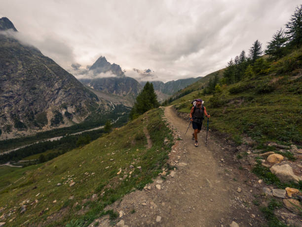 istock Happy Hiker on a Mountain Trail 2185928551