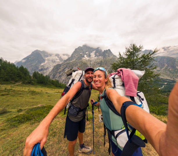 istock Happy Hikers Taking Selfie in Stunning Mountain Landscape 2185928934