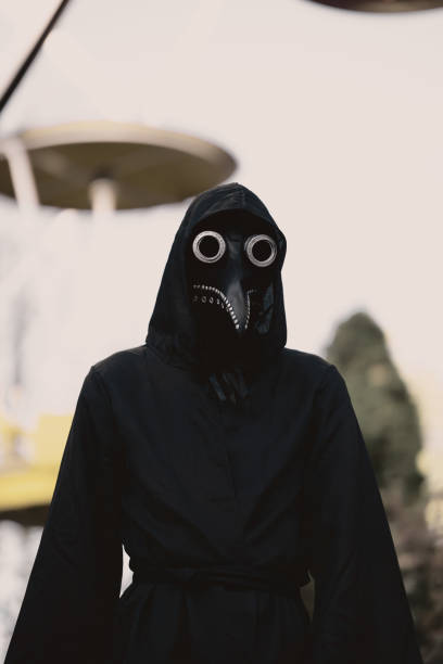 istock Doctor plague mask and suit. 2185930665