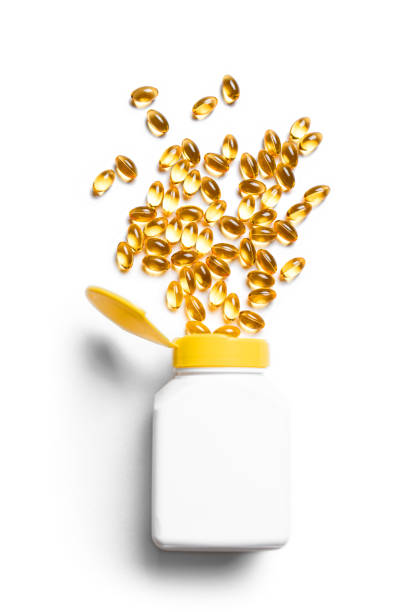 istock Omega-3 fish oil or Vitamin D3 supplement softgels 2185930685