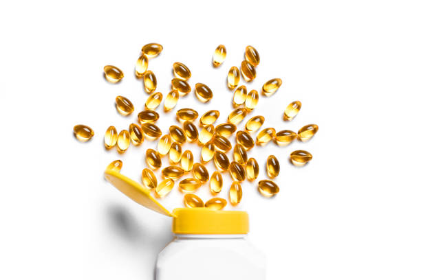istock Vitamin D3, omega 3 fish oil supplement softgel 2185930687