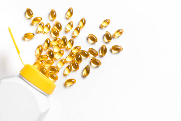istock Omega 3 fish oil supplement softgel capsules 2185930688