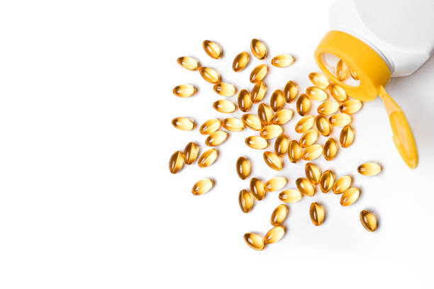 istock Omega 3 fish oil supplement softgel capsules 2185930696