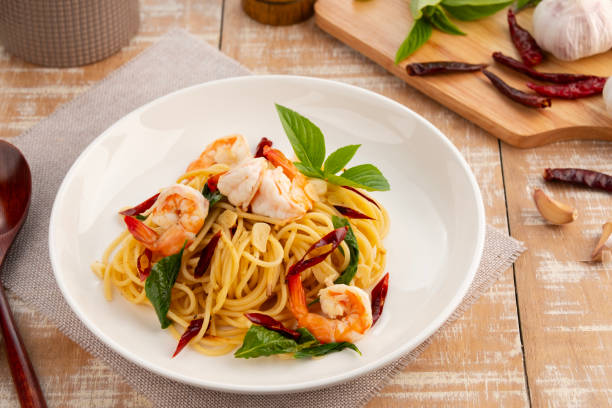 istock Stir Fried Spaghetti with Dried Chili and garlic with Shrimp. 2185935011