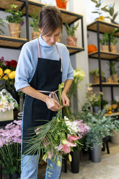 istock Florist in her flower shop 2185941212