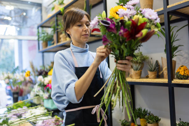 istock Florist in her flower shop 2185941255
