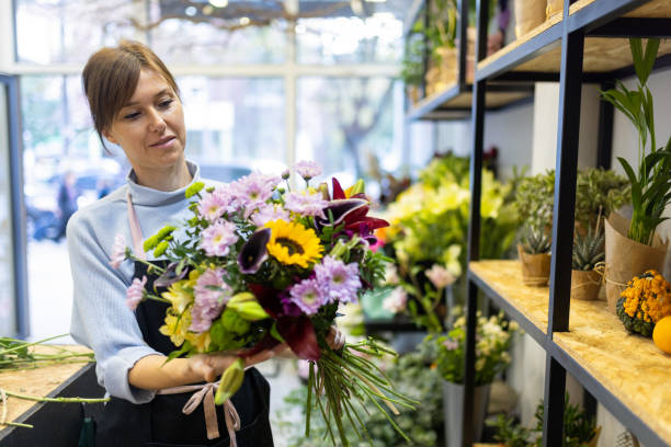 istock Florist in her flower shop 2185941265