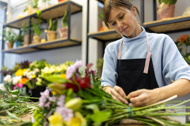 istock Florist in her flower shop 2185941291