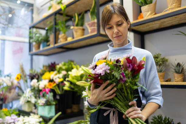 istock Florist in her flower shop 2185941298