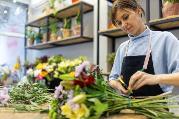 istock Florist in her flower shop 2185941310