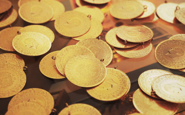 istock Turkish Jewelry Gold Coin Stack on Glass Counter 2185943056