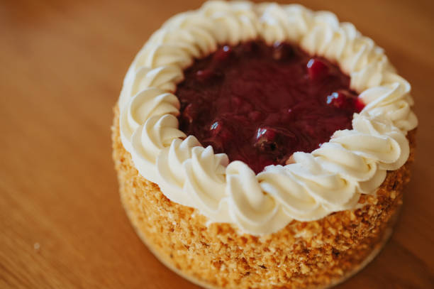 istock Top view of cake with cream and cherries. 2185944846
