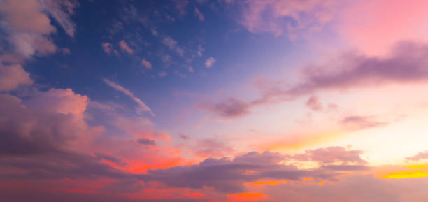 istock Pink sky and clouds background,Beach dawn, sunrise. Evening sky with clouds. Golden hours. afternoon vanilla sky. Seashore sunburn or Sunset 2185945381