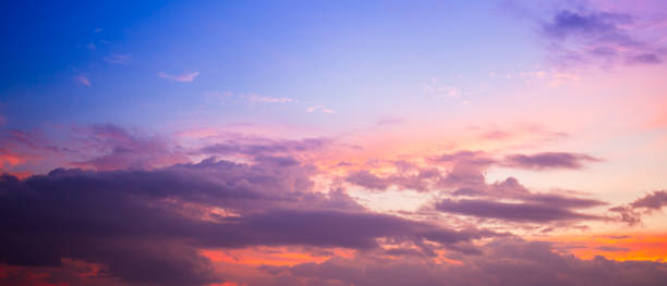 istock Pink sky and clouds background,Beach dawn, sunrise. Evening sky with clouds. Golden hours. afternoon vanilla sky. Seashore sunburn or Sunset 2185945513