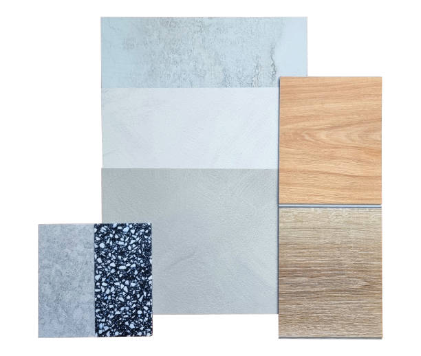 istock interior material samples in top view including palette of concrete laminateds, wooden vinyl flooring tiles and terrazzo quartz stone isolated on background with clipping path. 2185948150