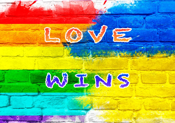 istock Colorful wall with the words love wins written on it 2185948528