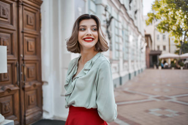 istock pretty woman outdoors red lips walk outdoors lifestyle 2185950248