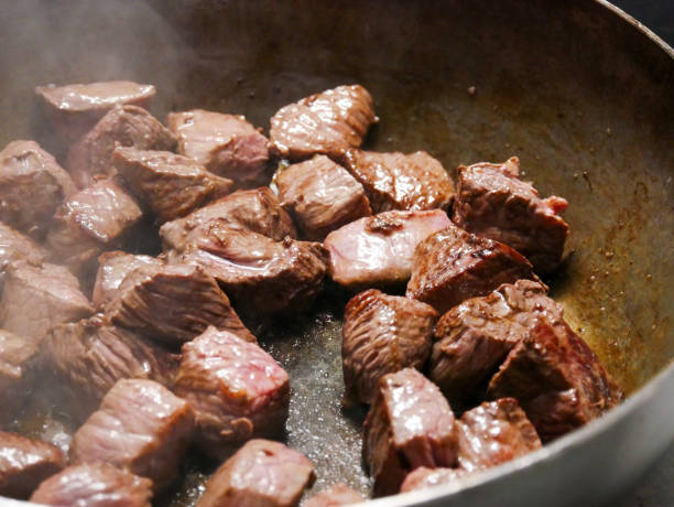 istock Meat browning in a pan 2185951043