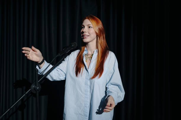 istock Engaging Woman Smiling During Public Speaking 2185953396