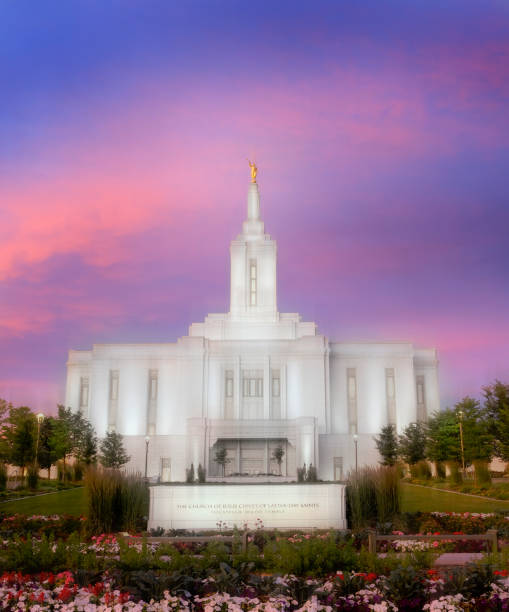 istock Pocatello LDS Mormon Latter-Day Saint Temple at Sunset with Glowing Lights 2185953475