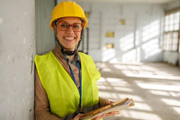 istock Woman architect at the construction site 2185953917